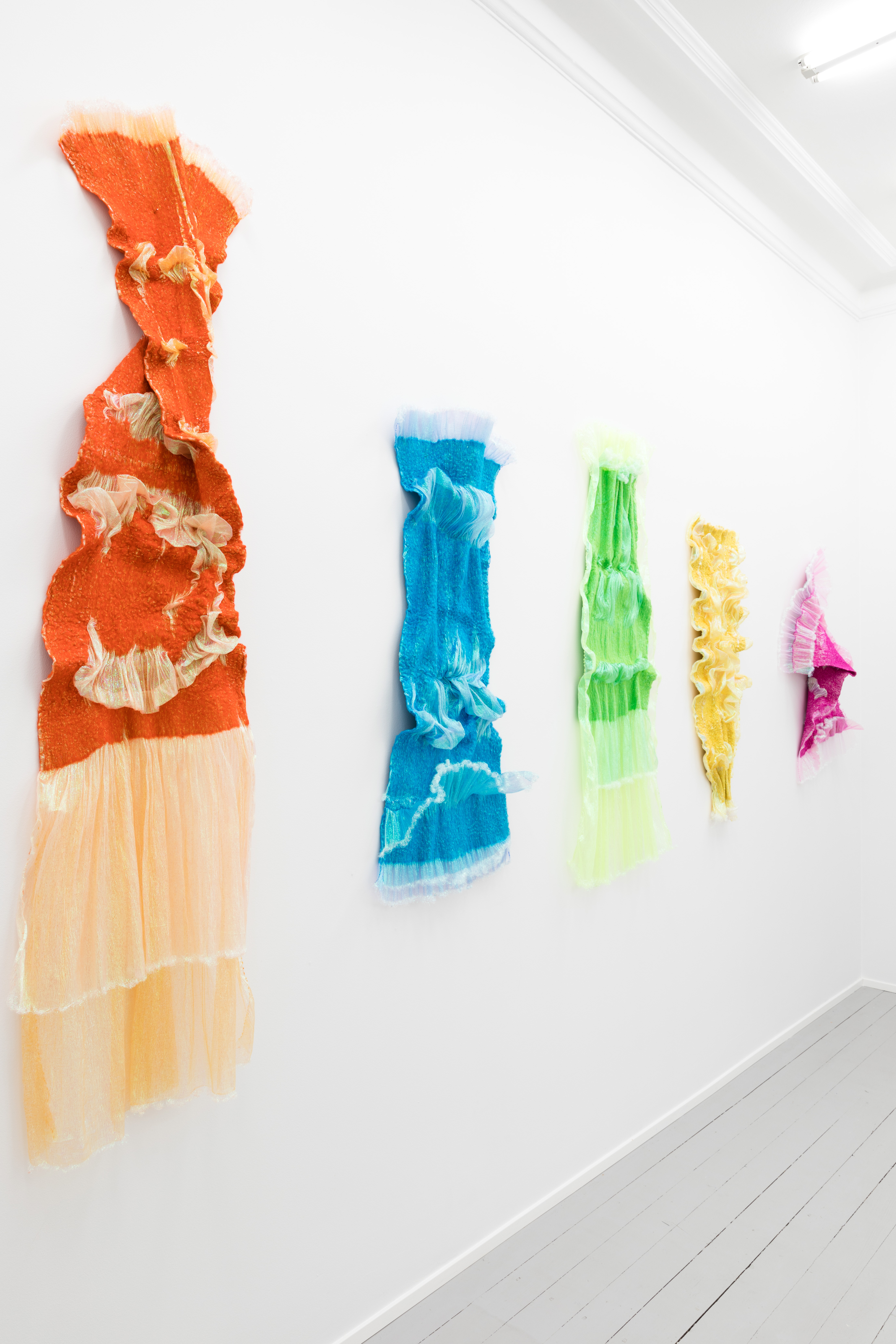 Rookie's Rave #2 Orange, 2018, Merino wool, polyester organza, 190 x 60 x 15 cm; Rookie's Rave #5 Turquoise, 2018, Merino wool, polyester organza, 120 x 55 x 10 cm; Rookie's Rave #4 Green, 2018, Merino wool, polyester organza, 140 x 75 x 8 cm; Rookie's Rave #3 Yellow, 2018, Merino wool, polyester organza, 110 x 45 x 8 cm; Rookie's Rave #8 Pink, 2018, Merino wool, polyester organza, 100 x 80 x 20 cm